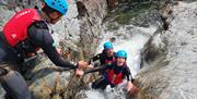 Visitors Extreme Ghyll Scrambling and Canyoning with Path to Adventure in Eskdale, Lake District