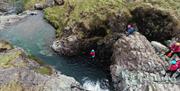 Visitors Extreme Ghyll Scrambling and Canyoning with Path to Adventure in Eskdale, Lake District