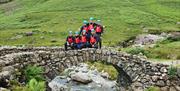 Visitors Extreme Ghyll Scrambling and Canyoning with Path to Adventure in Eskdale, Lake District