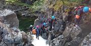 Visitors Extreme Ghyll Scrambling and Canyoning with Path to Adventure in Eskdale, Lake District