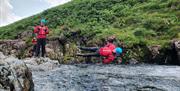 Visitors Extreme Ghyll Scrambling and Canyoning with Path to Adventure in Eskdale, Lake District