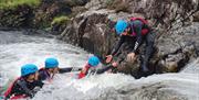 Visitors Extreme Ghyll Scrambling and Canyoning with Path to Adventure in Eskdale, Lake District