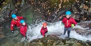 Visitors Family Gorge Walking with Path to Adventure in the Lake District, Cumbria