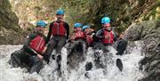 Visitors Family Gorge Walking with Path to Adventure in the Lake District, Cumbria