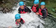 Visitors Family Gorge Walking with Path to Adventure in the Lake District, Cumbria