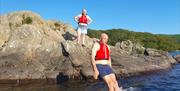 Visitors on a Guided Canoe Trip with Path to Adventure in Coniston, Lake District