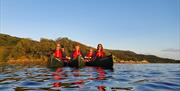 Visitors on a Guided Canoe Trip with Path to Adventure in Coniston, Lake District