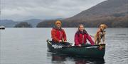 Visitors on a Guided Canoe Trip with Path to Adventure in Coniston, Lake District