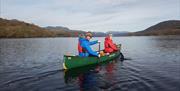 Visitors on a Guided Canoe Trip with Path to Adventure in Coniston, Lake District