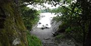 Visitors on a Guided Canoe Trip with Path to Adventure in Coniston, Lake District