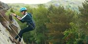 Visitor Rock Climbing with Path to Adventure in the Lake District, Cumbria