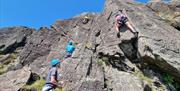 Visitors Rock Climbing with Path to Adventure in the Lake District, Cumbria