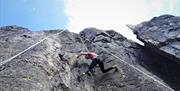 Visitor Rock Climbing with Path to Adventure in the Lake District, Cumbria