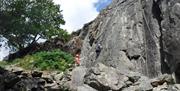 Visitors Rock Climbing with Path to Adventure in the Lake District, Cumbria