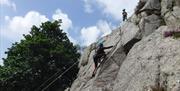 Visitors Rock Climbing with Path to Adventure in the Lake District, Cumbria