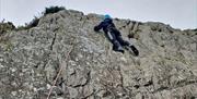 Visitors Rock Climbing with Path to Adventure in the Lake District, Cumbria