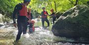 Young Family Ghyll Scrambling in the Lake District with Path to Adventure