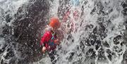 Young Family Ghyll Scrambling in the Lake District with Path to Adventure