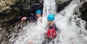 Young Family Ghyll Scrambling in the Lake District with Path to Adventure