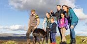 Family on a Scenic Walk near 
Park Cliffe Camping & Caravan Estate in Windermere, Lake District