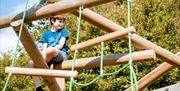 Child at the Playground at Park Cliffe Camping & Caravan Estate in Windermere, Lake District