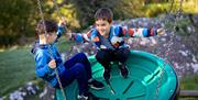 Children on the Playground at Park Cliffe Camping & Caravan Estate in Windermere, Lake District
