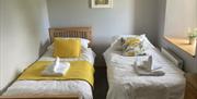 Twin bedroom at Patton Hall Farm Country Cottages near Kendal, Cumbria