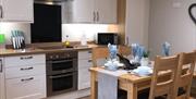 Kitchen and dining space at Patton Hall Farm Country Cottages near Kendal, Cumbria