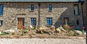 Entrances and garden at Patton Hall Farm Country Cottages near Kendal, Cumbria