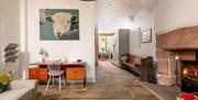 Lounge with Desk and View into the Kitchen and Dining Room at The Pele Tower, Killington Hall near Kirkby Lonsdale, Cumbria