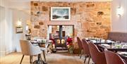 Dining room at the restaurant at Pentonbridge Inn in Penton, Cumbria