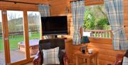 Lounge in Pheasant Lodge at Low Moor Head Farm in Longtown, Cumbria