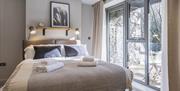 Bedroom at Primero Apartments in Backbarrow, Lake District