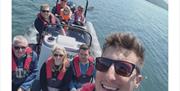 Snap Selfies on RIB Boat Tours on Windermere with Graythwaite Adventure in the Lake District, Cumbria