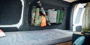 Rigged and Ready fishing rods packed up for transport in a campervan