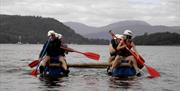 Raft Building with Mere Mountains in the Lake District, Cumbria