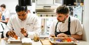 Kitchen Staff working at The Cedar Tree by Hrishikesh Desai at Farlam Hall near Brampton, Cumbria