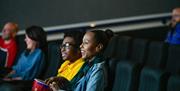 Visitors Enjoying a Film at Brewery Arts Centre in Kendal, Cumbria