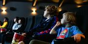 Children watching a film at Brewery Arts