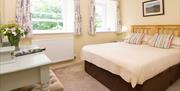 Bedroom at Stable Cottage at Rydal Hall in Rydal, Lake District