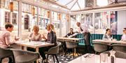 Conservatory Seating at Brasserie 31 at Skiddaw Hotel in Keswick, Lake District