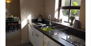Kitchen and washing facilities at The Saplings in Bothel, Cumbria