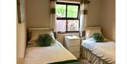 Twin bedroom at The Saplings in Bothel, Cumbria