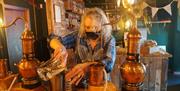 Owner Zoe Gives a Demonstration at Make Your Own Gin Experience at Shed 1 Distillery in Ulverston, Cumbria