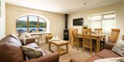 Lounge and dining area at Hill of Oaks Holiday Park in Windermere, Lake District