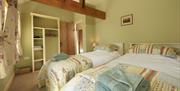 Twin Bedroom in Spring Cottage at Helm Mount Lodge & Cottages in Barrows Green, Cumbria