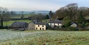 Exterior of Spring Cottage at Helm Mount Lodge & Cottages in Barrows Green, Cumbria