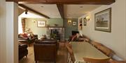 Living and Dining Area in Spring Cottage at Helm Mount Lodge & Cottages in Barrows Green, Cumbria