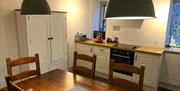 Kitchen-dining area at Wansfell double bedroom at Swarthmoor Hall, near Ulverston.