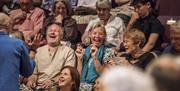 Audience Enjoying a Show at Theatre by the Lake in Keswick, Lake District